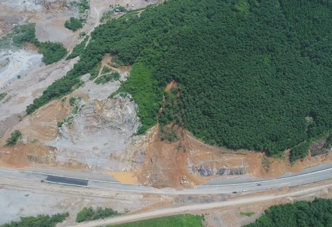 Survey, monitor, design and stabilize slope at Km27+950 Ha Long - Van Don Expressway construction project